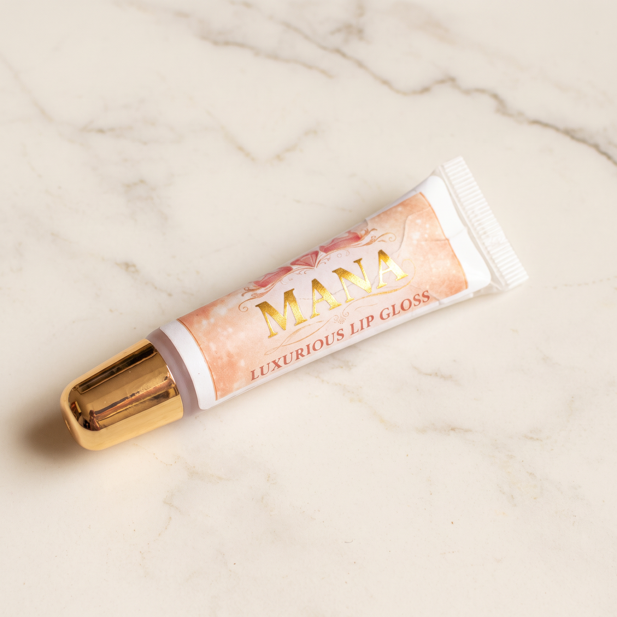 Mana Collective Clear Coconut Lip Gloss professional product image